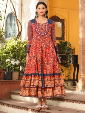 Jashvi Rust Cotton Ikat Printed Layered Maxi Dress With Thread Embroidery & Dori Tassel Tie-Up At Waist