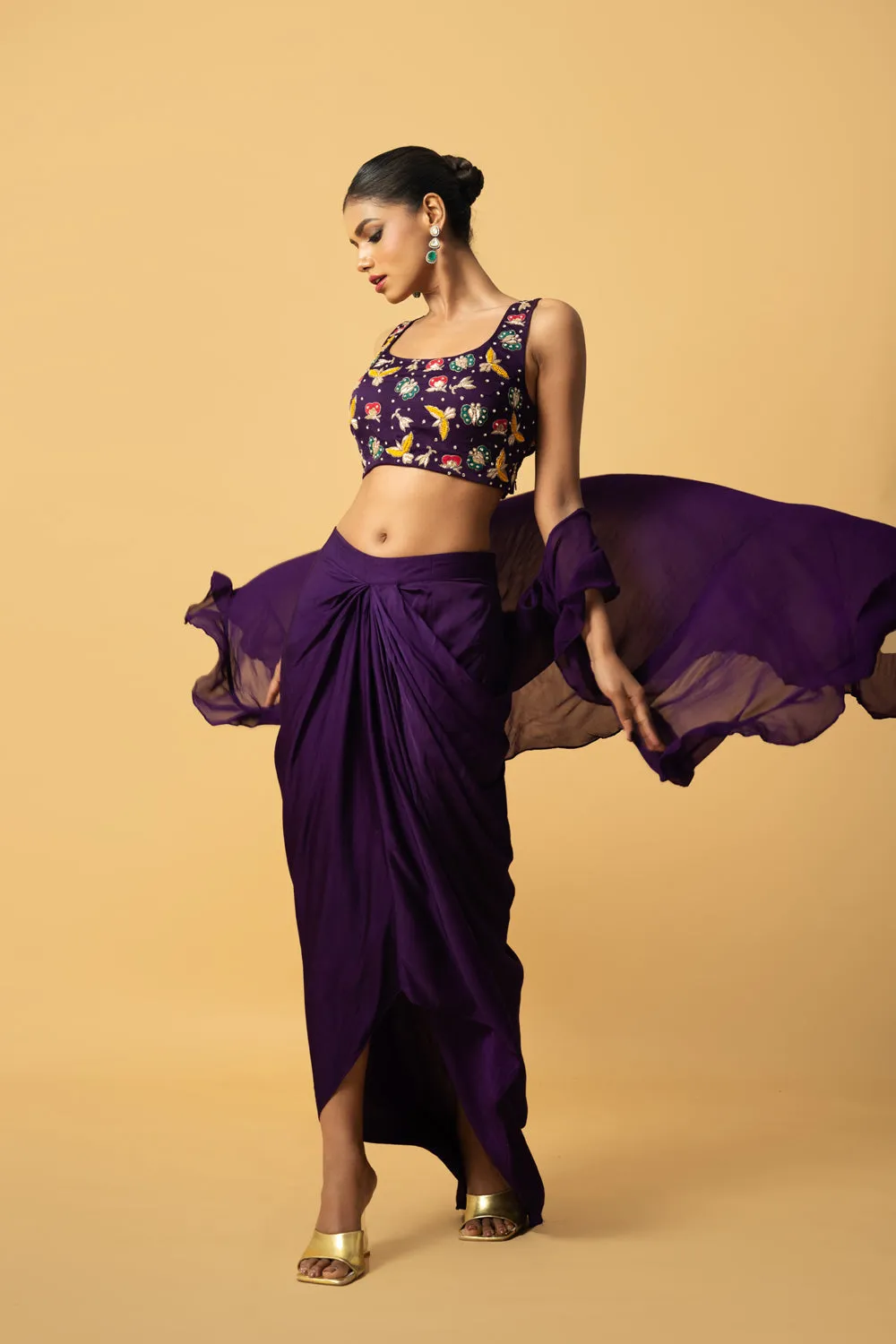 Violet Co - Ord Set With Multi Coloured Hand Embroidery On The Blouse . Blouse & Dhoti Is Of Modal Satin , Cape Is Of Georgette