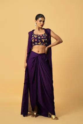 Violet Co - Ord Set With Multi Coloured Hand Embroidery On The Blouse . Blouse & Dhoti Is Of Modal Satin , Cape Is Of Georgette